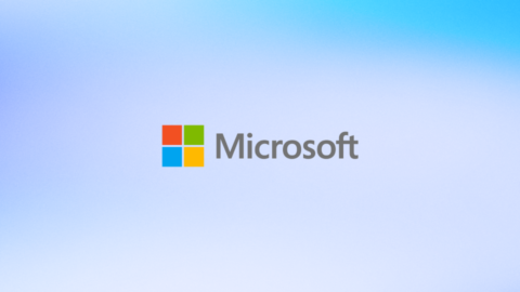 Image of Microsoft logo against a gradient blue background
